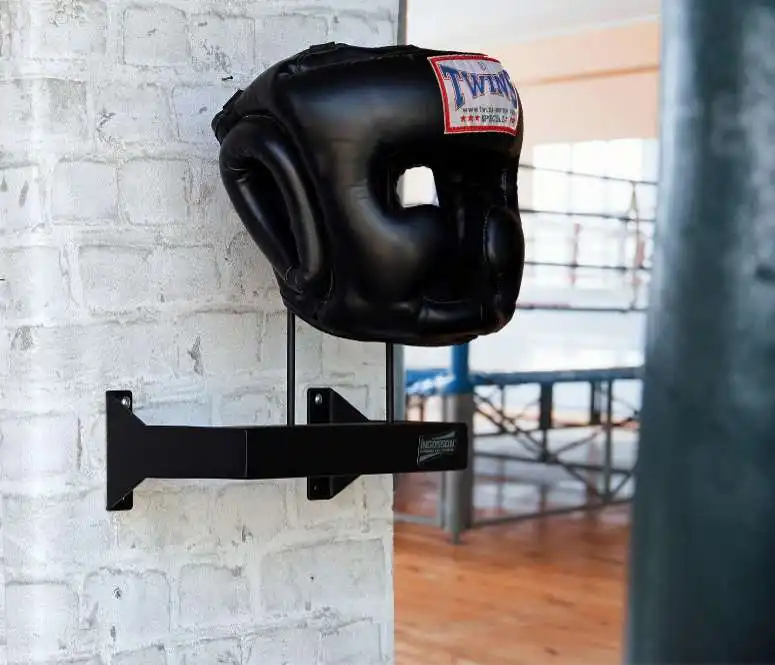 wall mounted rack for fighting headgear in a boxing gym