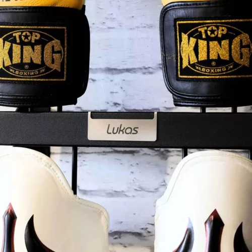a name plate with the inscription Lukas on a black boxing glove rack of the Ingosson brand